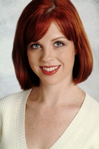 Headshot of a beautiful girl with red hair